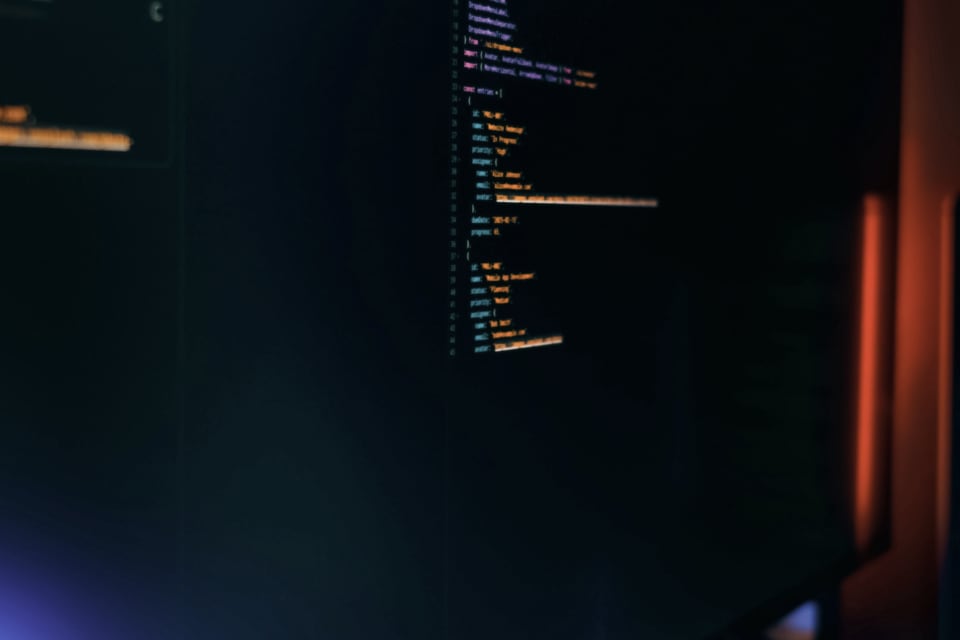 Code illuminated on a dark screen